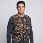 Three-quarter view of the camo utility vest worn over a long-sleeve top
