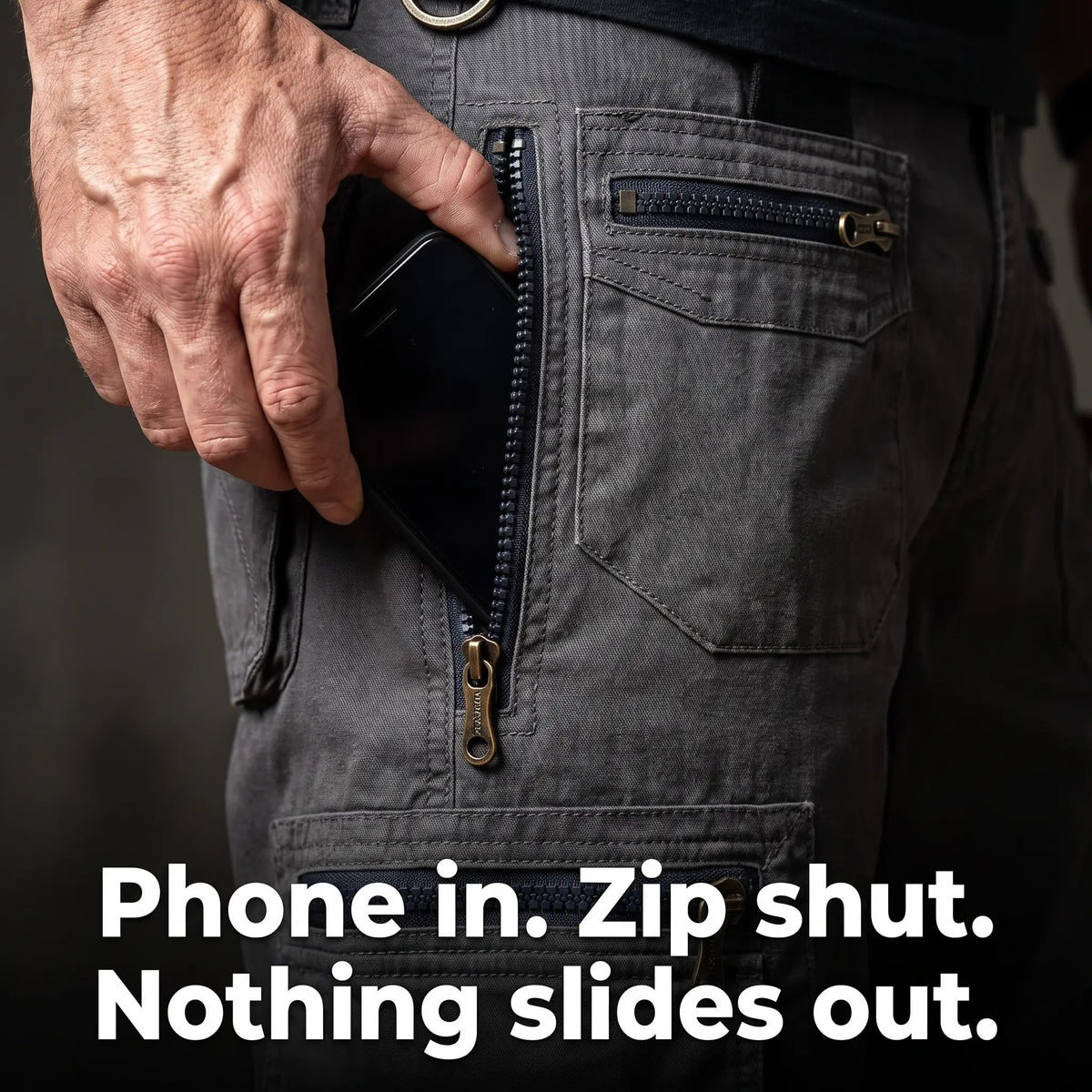 Phone going into the zipped thigh pocket of the cargo shorts