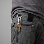 Keys clipped to the D-ring on the belt loop of the cargo shorts