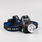LED head torch with zoom lamp head and blue strap