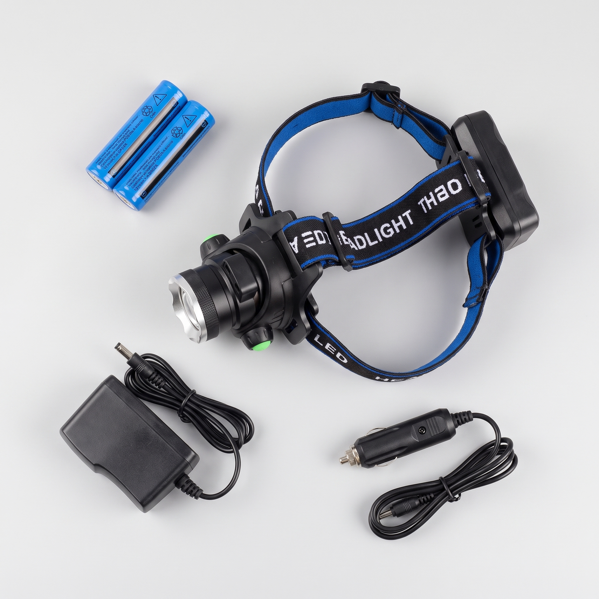 Head torch with two 18650 cells, mains charger and car charger