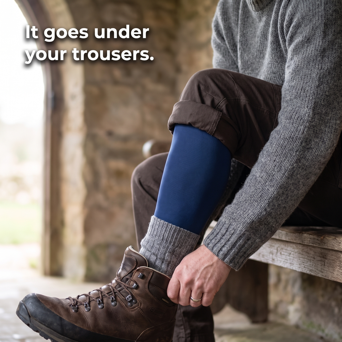 Trouser leg lifted at the boot showing the navy long johns leggings underneath: it goes under your trousers