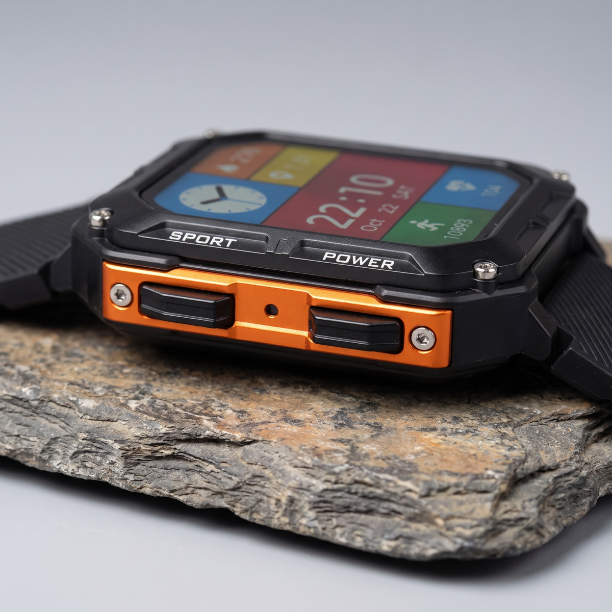 Close-up of the rugged smart watch case screws and Sport and Power buttons