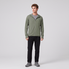 Man wearing the army green full-zip sun hoodie, full body
