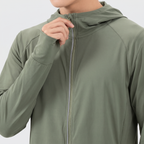 Close-up of the zip at the collar with the thin reflective trim running beside it