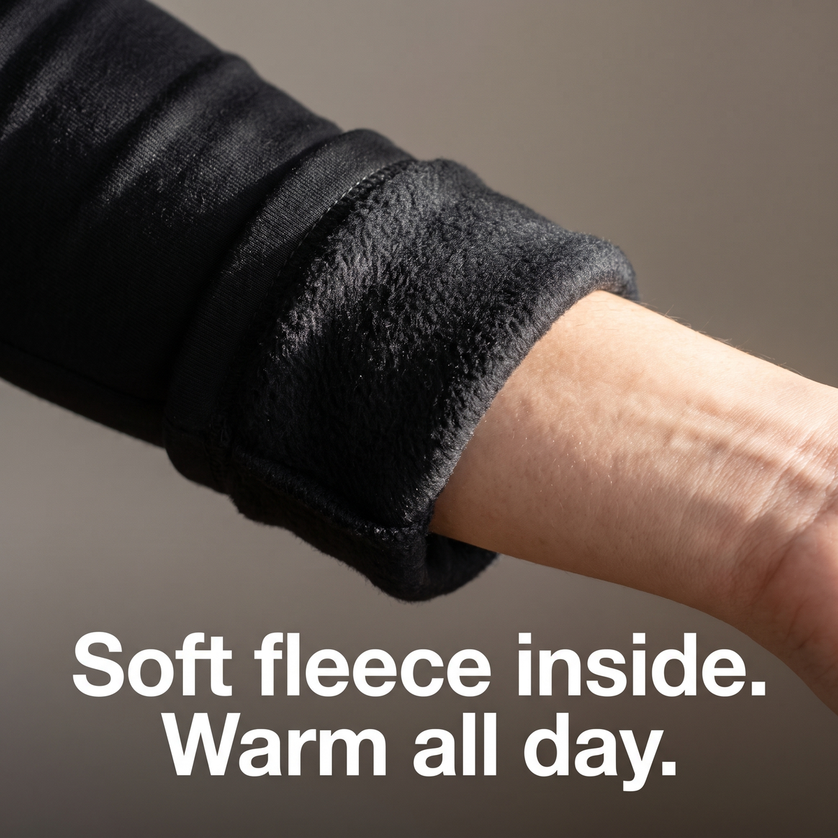 Folded cuff showing the soft fleece interior of the women's thermal top