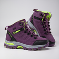 Women's walking boots in purple with lime trim, mid-cut lace-up pair
