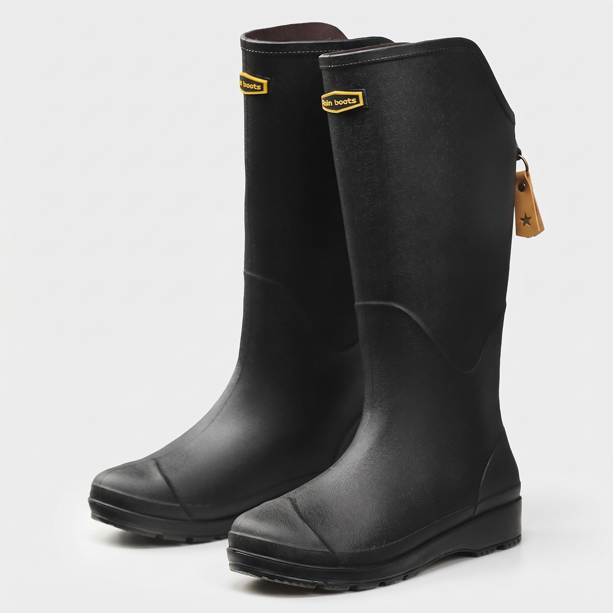 Women's knee high wellies in Black, three-quarter front view