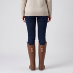 Back view of the women's knee high wellies worn, showing the pull tabs