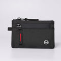 Terrabound zip card holder in Black Red, front view on grey
