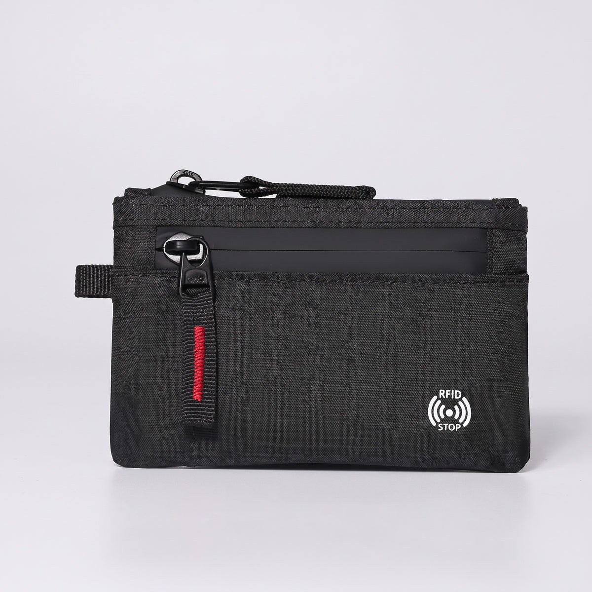 Terrabound zip card holder in Black Red, front view on grey