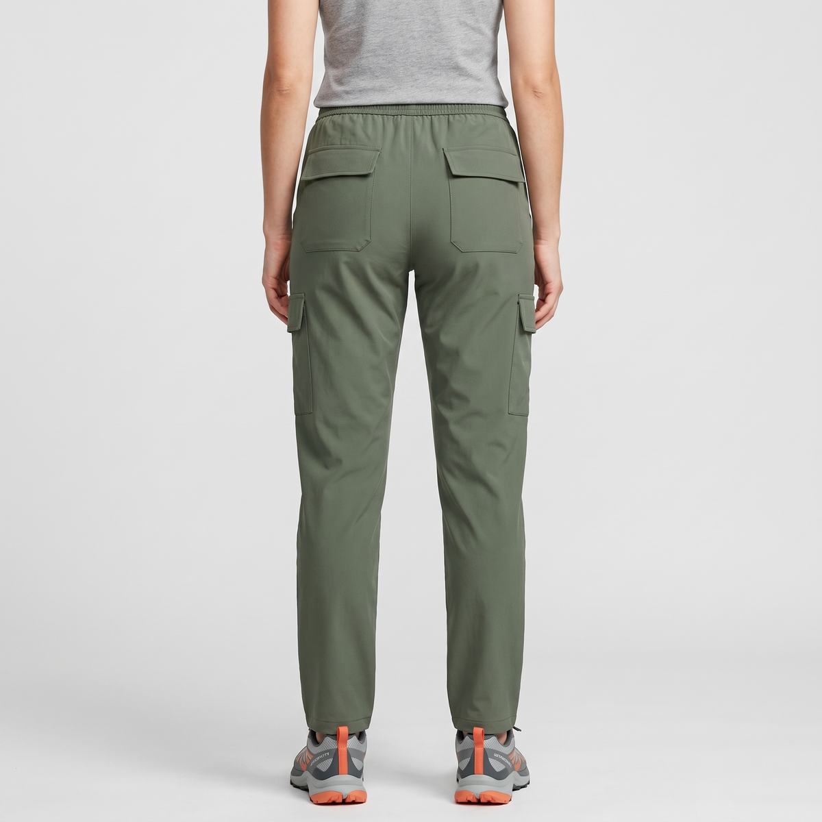 Terrabound women's cargo trousers in green worn, back view with two flap back pockets