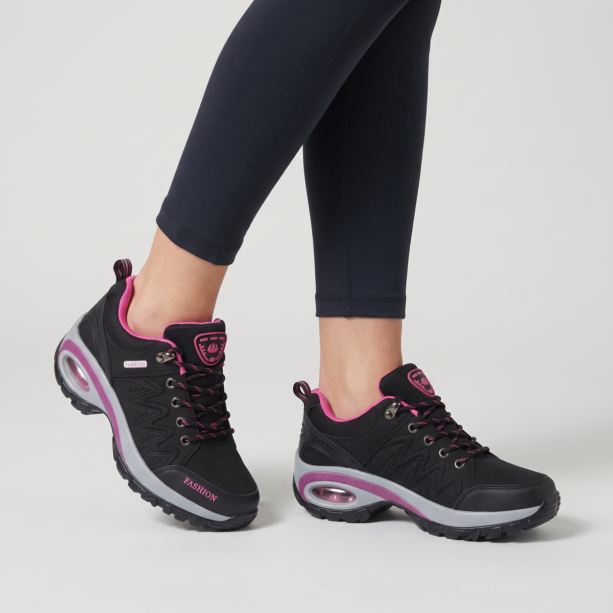 Terrabound women's walking shoes in Black worn on feet, studio view from the knees down